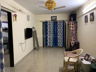 Gallery Cover Image of 858 Sq.ft 1 BHK Apartment for buy in Nishigandha Apartment Shivane, Shivane for 3350000