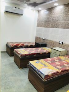 Bedroom Image of Home Living PG & Accommodation in Laxmi Nagar