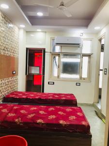Bedroom Image of Home Living PG & Accommodation in Laxmi Nagar