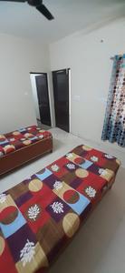 Bedroom Image of Dharam Girls PG in Sector 19