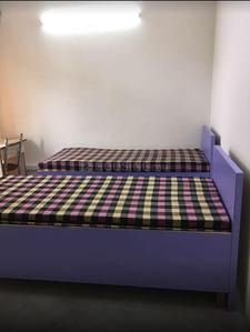 Bedroom Image of Eshu PG in Greater Kailash