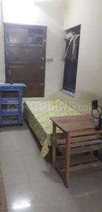Bedroom Image of Debroy PG in New Alipore