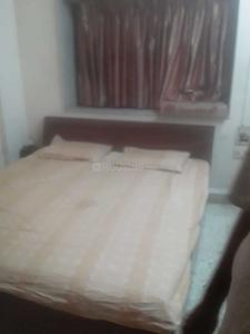 Bedroom Image of Nirmal Estate PG in Thane West