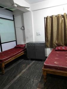 गणना भारती में रक्षा पीजी में बेडरूम की तस्वीर