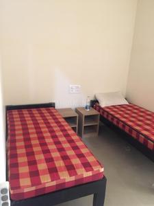 Bedroom Image of Annapoorneshwari Comforts PG in Jayanagar