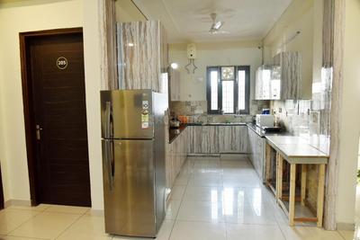 Kitchen Image of Nirvana Rooms PG in Sector 46