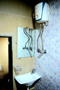 Common Bathroom Image of Sunny's Hostel in Kandivali West