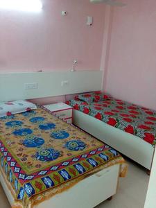 Bedroom Image of Shri Sai Kripa PG in Krishna Nagar