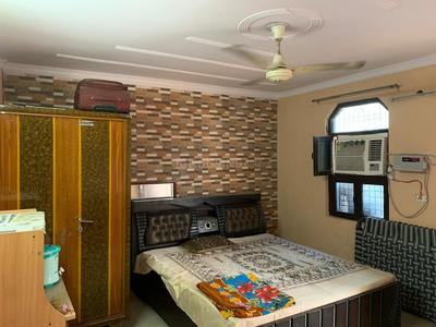 Bedroom Image of Gayatri PG in Chhattarpur